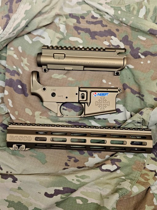AR upper, lower and handguard finished in Burnt Bronze with engraved scripture and cross